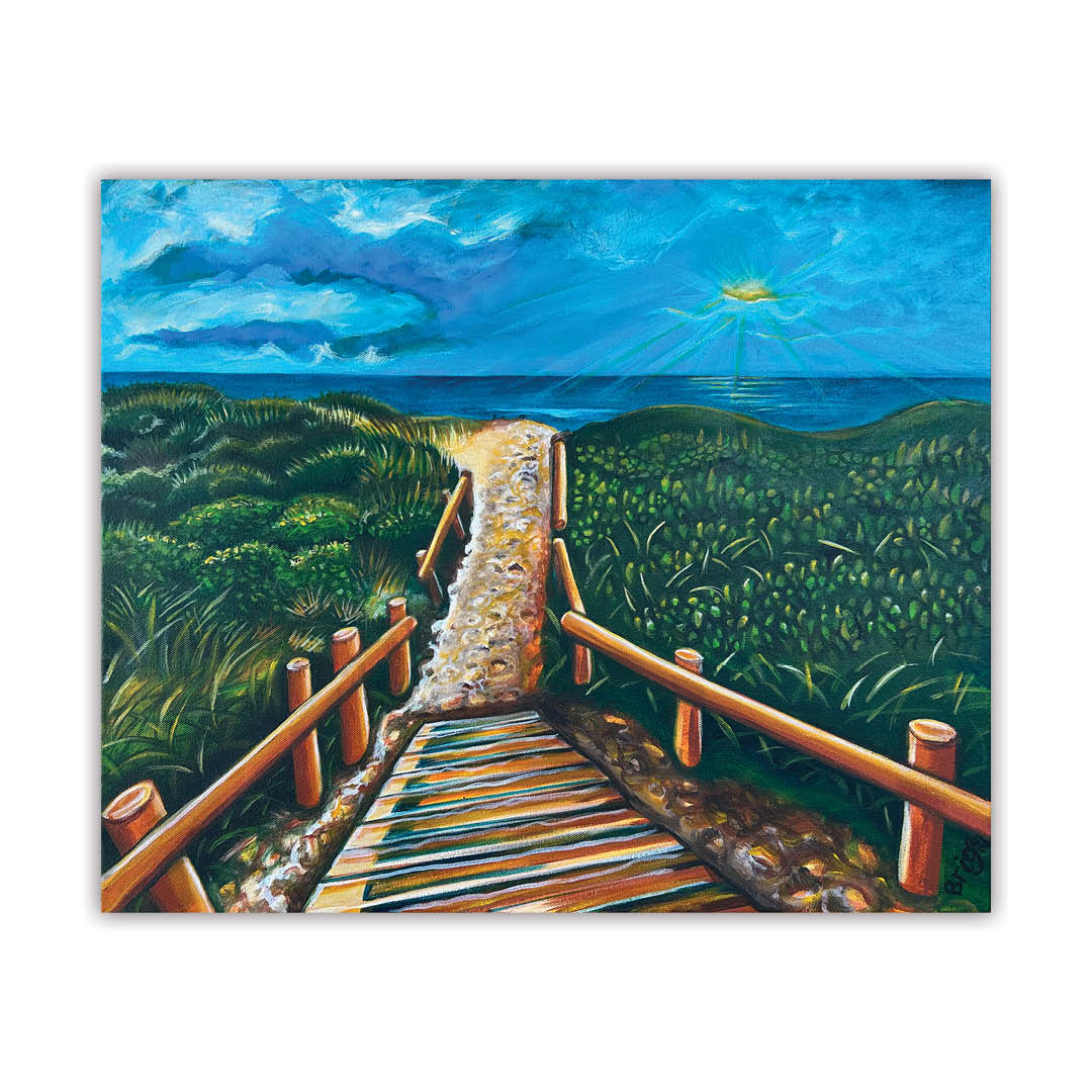 West Coast Winter by Brigitte James, showing steps through green dunes towards the ocean beneath a blue winter sky, against white.