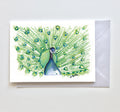 Peacock Watercolour with Hearts greeting card by Brigitte James, shown with an envelope behind it.